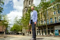 MARTIN MEIJER FINANCE EN CONTROL GRONINGEN, op de grote markt, martini toren op de achtergrond